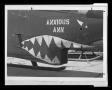 Photograph: [Photograph of a helicopter with shark teeth nose art]