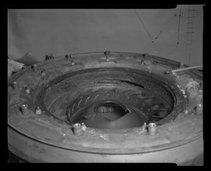 Primary view of object titled '[Photograph of a round helicopter part, 2]'.