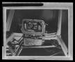 Thumbnail image of item number 1 in: '[Photograph of some mechanical components on the metal frame of an aircraft]'.