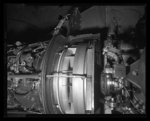 Primary view of object titled '[Photograph of a closeup of a UH-1F Iroquois helicopter's engine assembly]'.