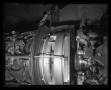 Thumbnail image of item number 1 in: '[Photograph of a closeup of a UH-1F Iroquois helicopter's engine assembly]'.