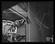 Photograph: [Photograph of bundles of wiring inside a UH-1F Iroquois helicopter]