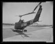 Photograph: [Photograph of a back view of a UH-1B Iroquois helicopter]