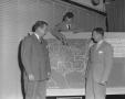 Photograph: [Three Men Looking at a  Weather Map]