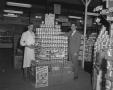 Photograph: [Portrait of Two Men with Cans of "Ajax"]