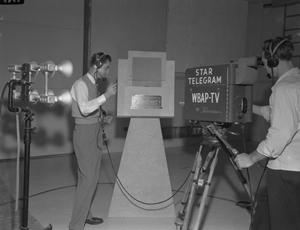 Primary view of object titled '[T.V. Camera Doing Blue-Bonnet Beer Course]'.