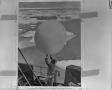 Photograph: [Man Releasing a Weather Balloon]