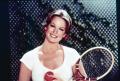 Thumbnail image of item number 1 in: '[Phyllis George holding a tennis racquet]'.