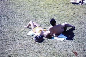 Primary view of object titled '[People sunbathing in swimsuits]'.