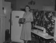 Photograph: [Woman Holding a Toaster]