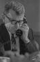 Photograph: [Dr. Robert Toulouse holding a telephone]