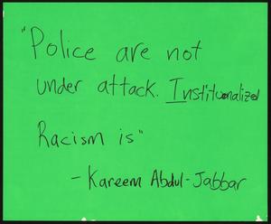 Primary view of object titled '[Green "Police Are Not Under Attack" poster]'.