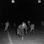 Primary view of [Football player running to the camera]
