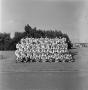 Photograph: [NTSU football team picture on the grass]