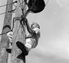 Photograph: [electrician at work]