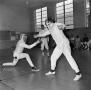 Photograph: [Women fencing in Physical Education]