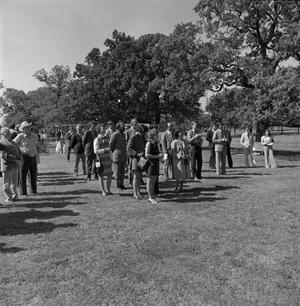 Primary view of object titled '[Small crowd in a park]'.