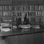 Photograph: [Dr. L.F. Connell at his desk, 10]
