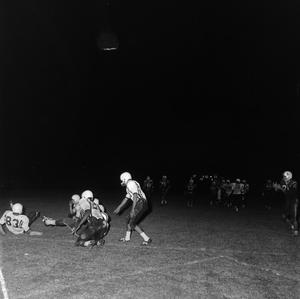Primary view of object titled '[Football players on the football field]'.