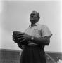 Photograph: [Odus Mitchell with a football]