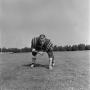Photograph: [Football player touching the ground, 34]