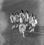 Photograph: [Photograph of a drum major and majorettes #6]