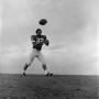 Photograph: [Football player on a hill, 7]