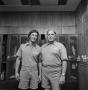 Photograph: [Two football staff members]