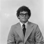 Photograph: [NTSU staff member in a suit, 2]