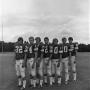 Photograph: [Seven football players in a line, 3]
