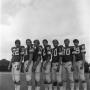 Photograph: [Seven football players in a line]