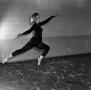 Photograph: [A dancer leaping into the air, 4]