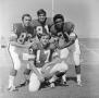 Photograph: [Four NTSU football players]