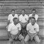 Photograph: [NTSU football staff sitting, 2]