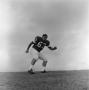 Photograph: [Football player on a hill, 2]