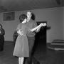 Photograph: [Couple dancing at the golf clubhouse]