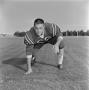 Photograph: [Football player touching the ground, 19]
