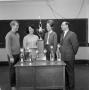 Photograph: [Unknown group of people with debate trophies]