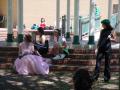 Photograph: [Actresses sitting on pavilion steps 1]