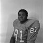 Photograph: [Football player sitting for a portrait, 27]