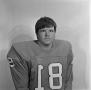 Photograph: [Football player sitting for a portrait, 21]