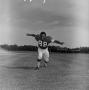 Photograph: [Football player #88, James Smith, running to the camera with arms ou…