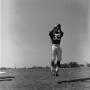 Photograph: [Football player #33, Mike Franklin, catching a ball at eye level]