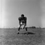 Photograph: [Football player #89 stands hunched into his shoulders, 2]