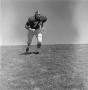 Photograph: [Football player #74, Gary Yancy, jogging and looking off camera, 2]