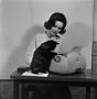 Photograph: [Photograph of a woman with a cat #12]