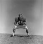 Photograph: [Football player #45, Steve Ramsey, set low to receive a pass]