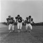 Photograph: [Football teammates #30, #54 and #61 from the 1971 season]