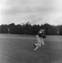 Photograph: [Football player running with the ball, 29]