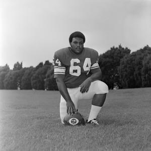 Primary view of object titled '[Posed individual photo of #64 S. Golden from the 1971 season, 2]'.